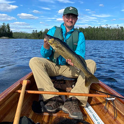 Owner_Holding_Fish